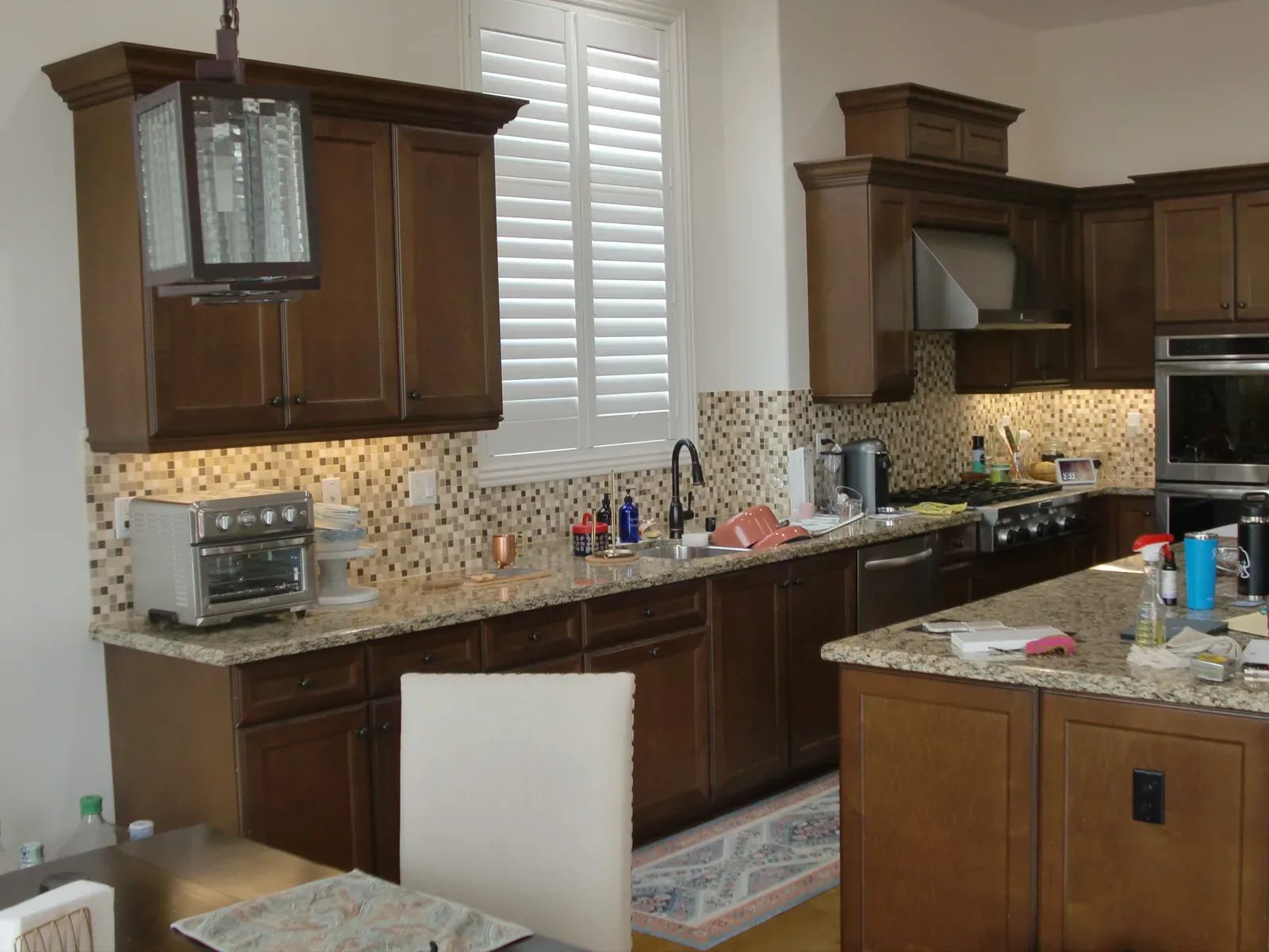 Dark stained cabinets before refinishing